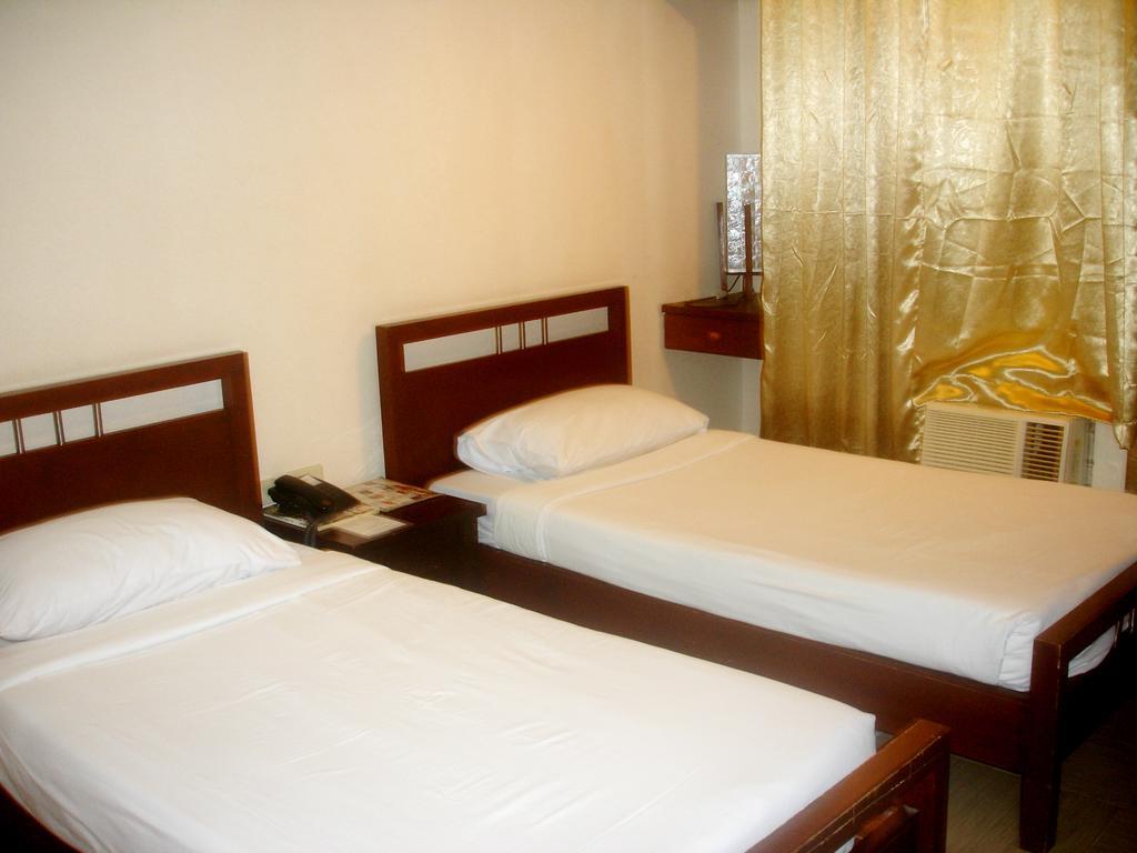 Roxas Midtown Hotel ห้อง รูปภาพ